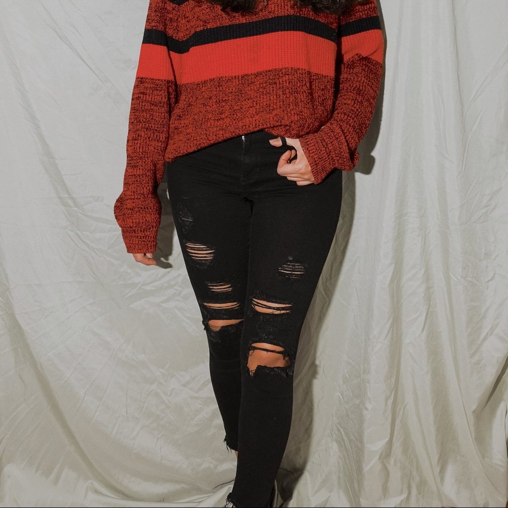 Levi’s distressed black skinny jeans